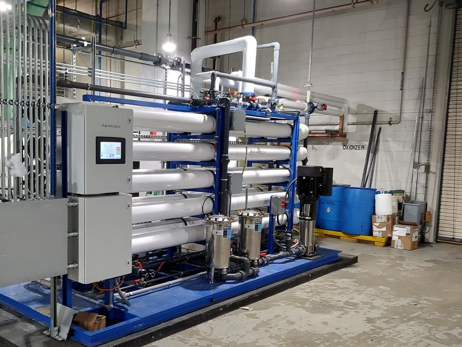Reverse osmosis trains and Aqualogix controller treating groundwater for cooling tower makeup